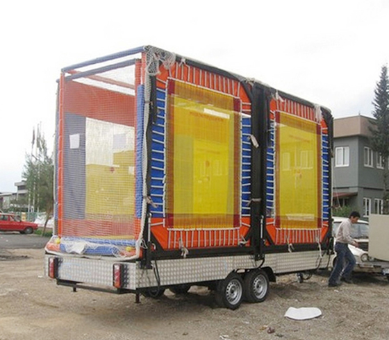 Foldable trampoline park with trailer